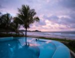 photo of swimming pool near ocean